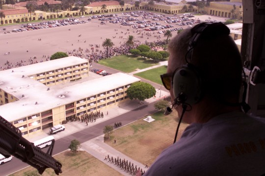 Cpl. Beddoe flying over MCRD San Diego in a restored USMC Sikorsky UH-34D Helicopter